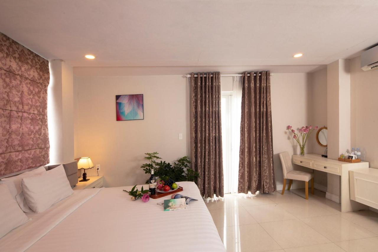 Sunshine Boutique Hotel Phu My Hung Хошимин Экстерьер фото