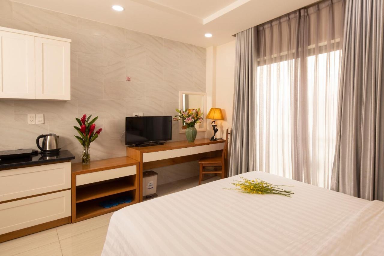 Sunshine Boutique Hotel Phu My Hung Хошимин Экстерьер фото