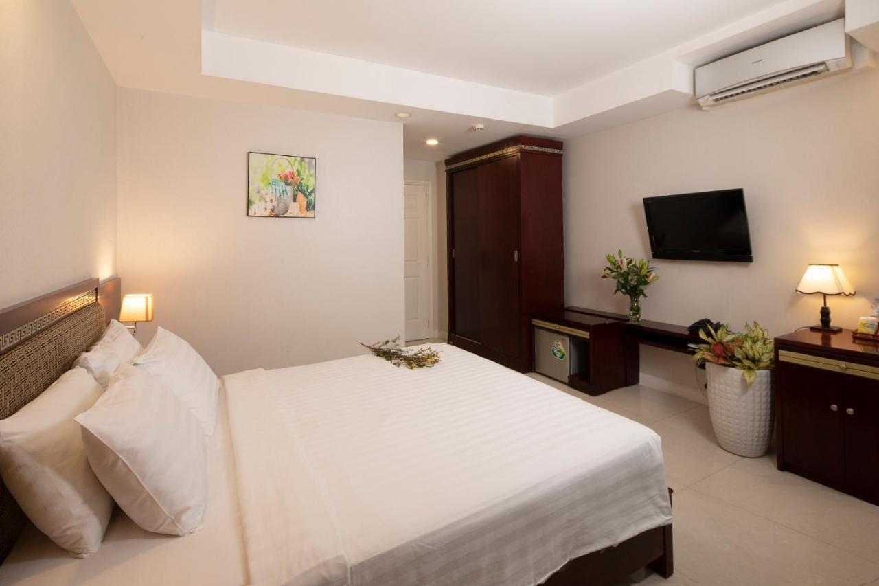 Sunshine Boutique Hotel Phu My Hung Хошимин Экстерьер фото