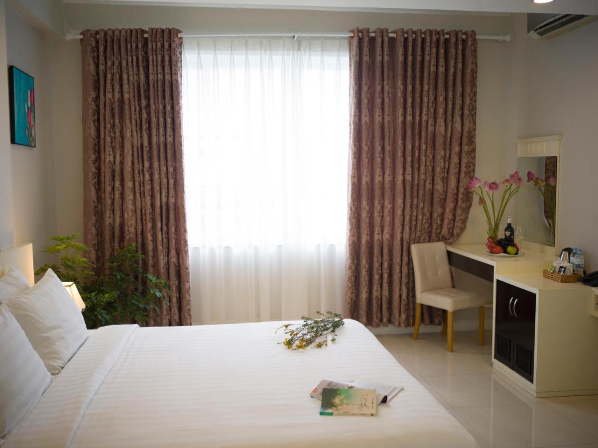 Sunshine Boutique Hotel Phu My Hung Хошимин Экстерьер фото
