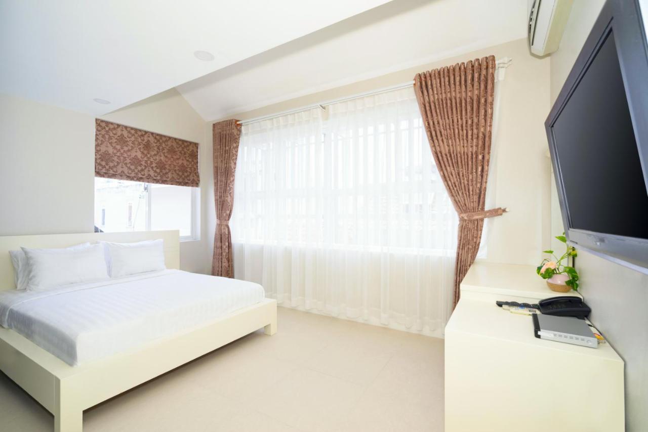 Sunshine Boutique Hotel Phu My Hung Хошимин Экстерьер фото